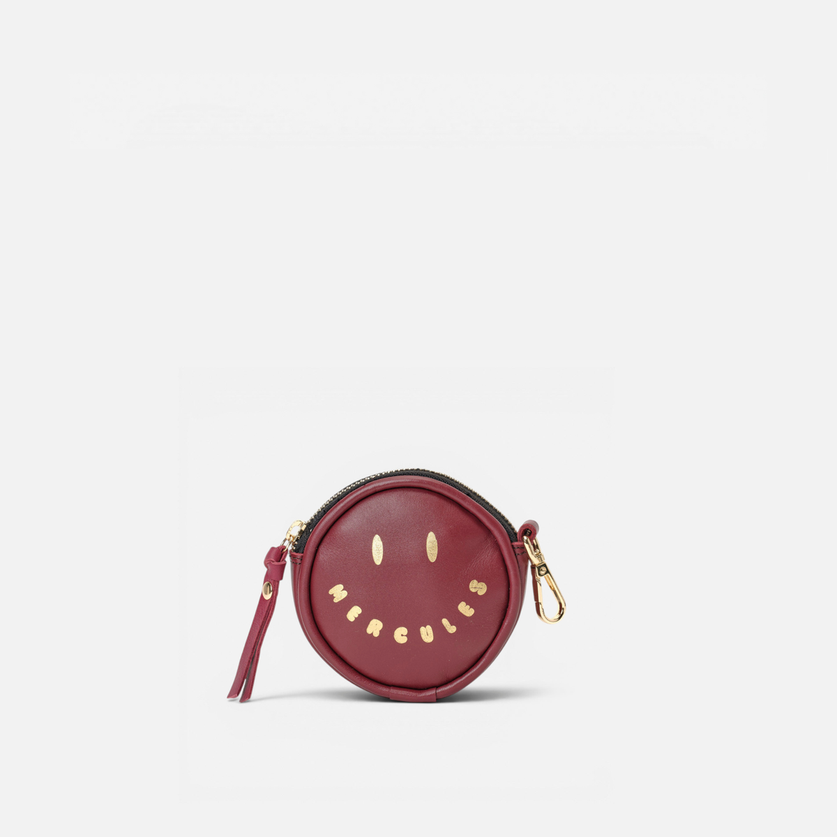 Monedero redondo de piel Monedero Smiley color burdeos, de Mercules