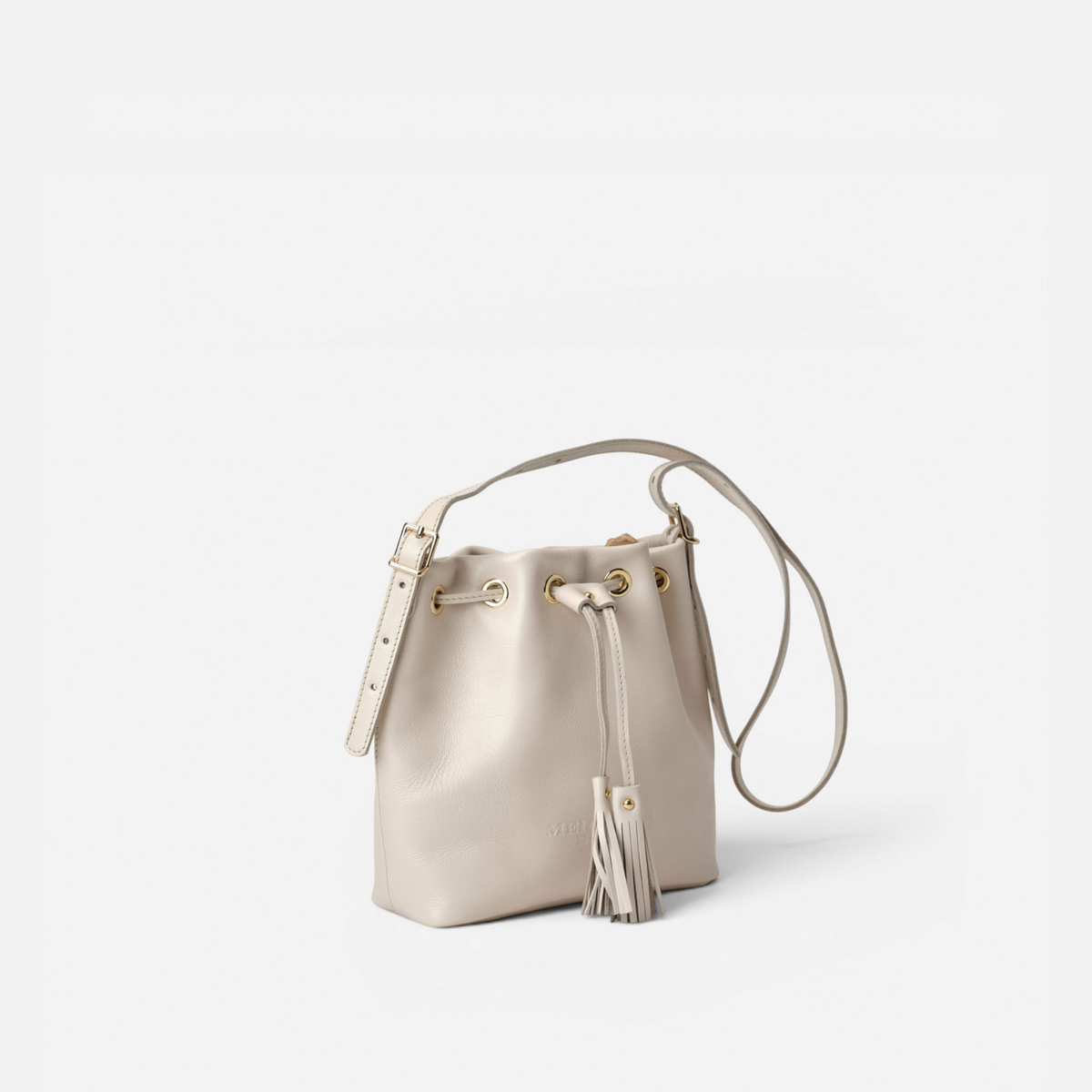 Otra vista: bolso bombonera de piel Pampa color hueso, de Mercules