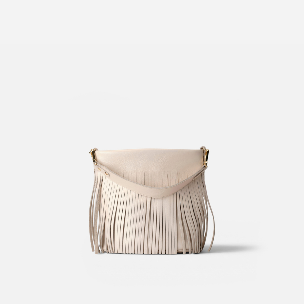 Bolso de piel con flecos Tango flecos color hueso, de Mercules
