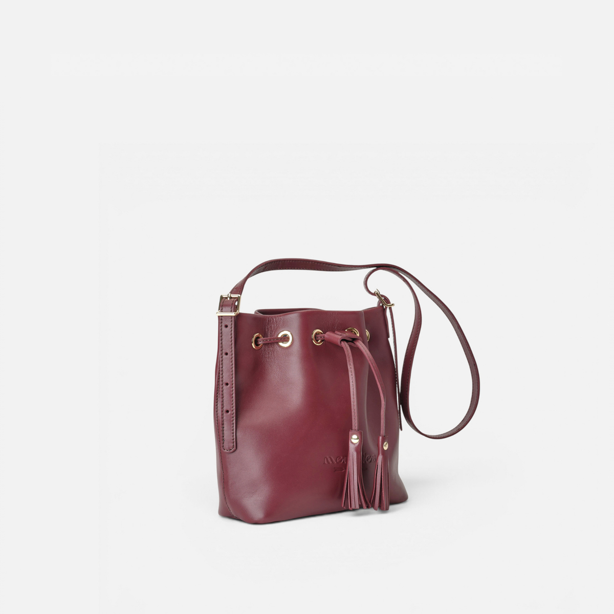 Otra vista: bolso bombonera de piel Pampa color burdeos, de Mercules